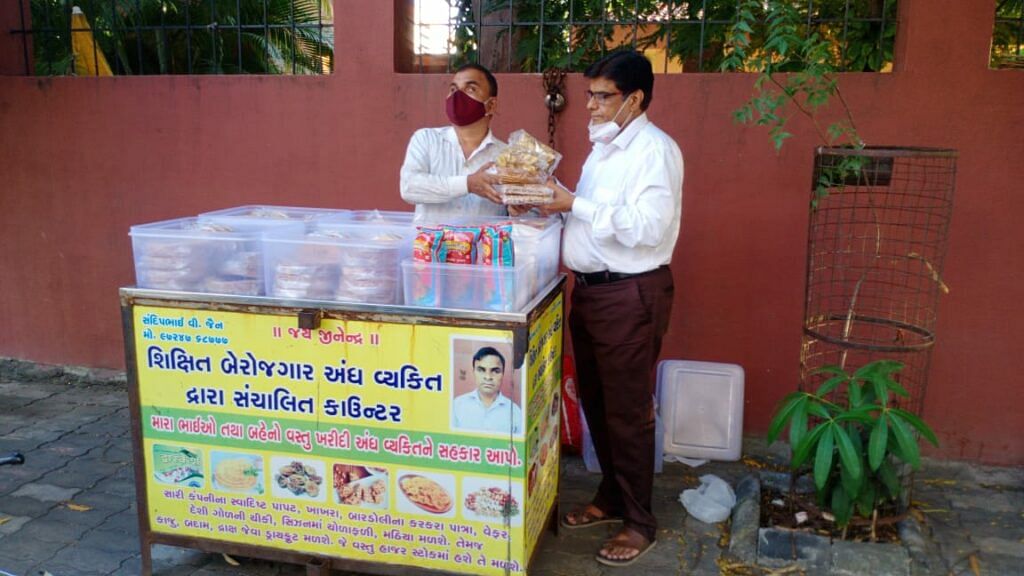 Sandipbhai giving Namkins to Customer